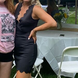 Scalloped black dress